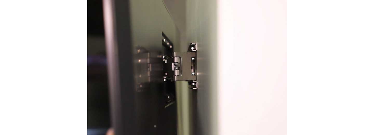A close-up shot of the integrated bracket which holds the LG GX Gallery series TV against the wall