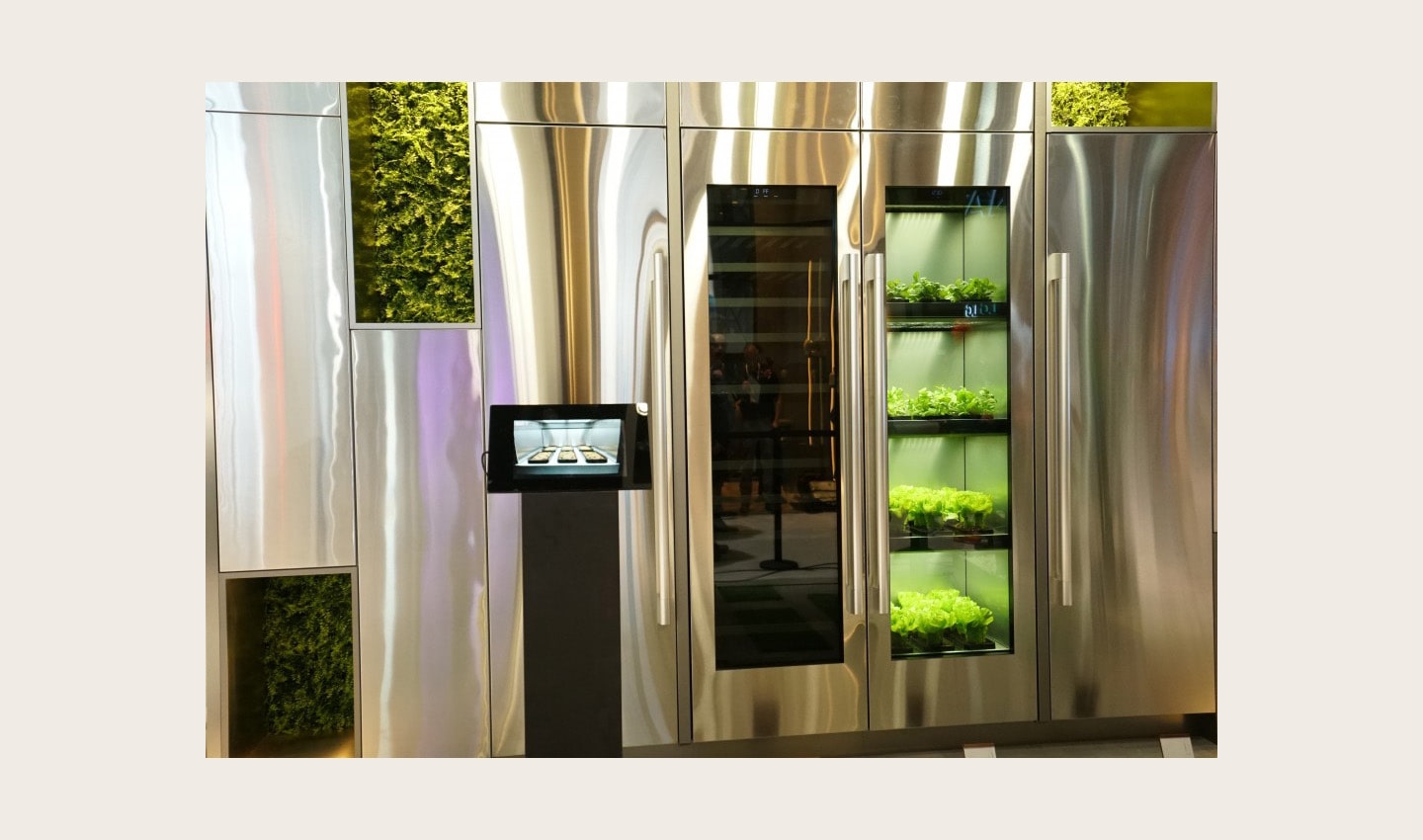 A front view of LG’s indoor gardening appliance and wine cellar built into the wall of the LG ThinQ Home Zone at CES 2020