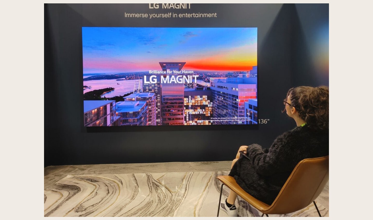 A visitor taking a look at LG MAGNIT installed at HITEC 2023