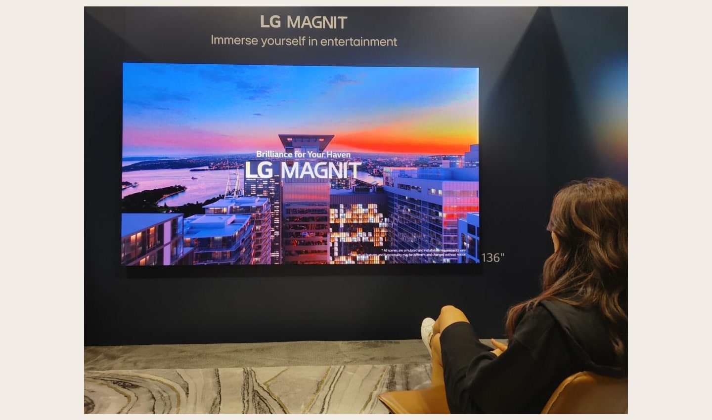 A visitor taking a look at LG MAGNIT installed at HITEC 2023