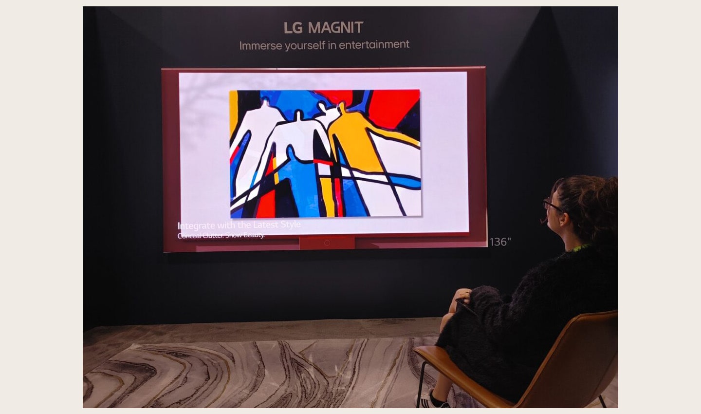 A visitor taking a look at LG MAGNIT installed at HITEC 2023