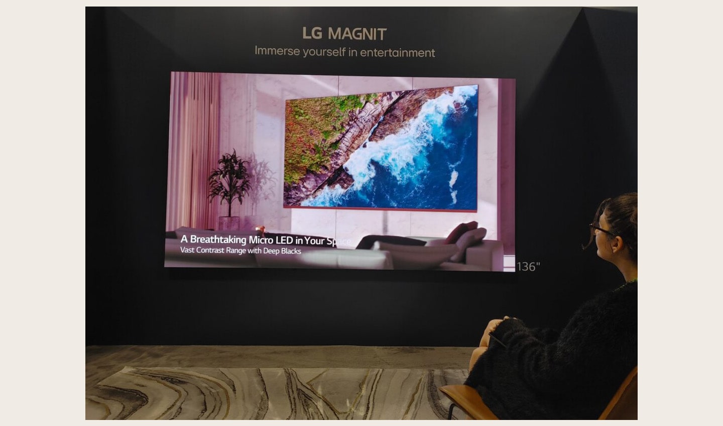 A visitor taking a look at LG MAGNIT installed at HITEC 2023