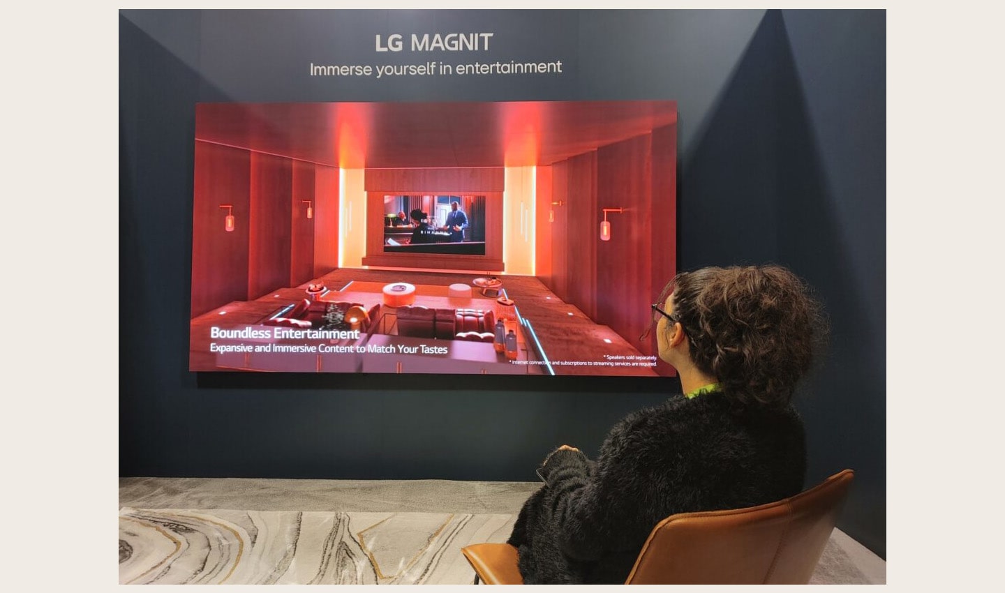 A visitor taking a look at LG MAGNIT installed at HITEC 2023