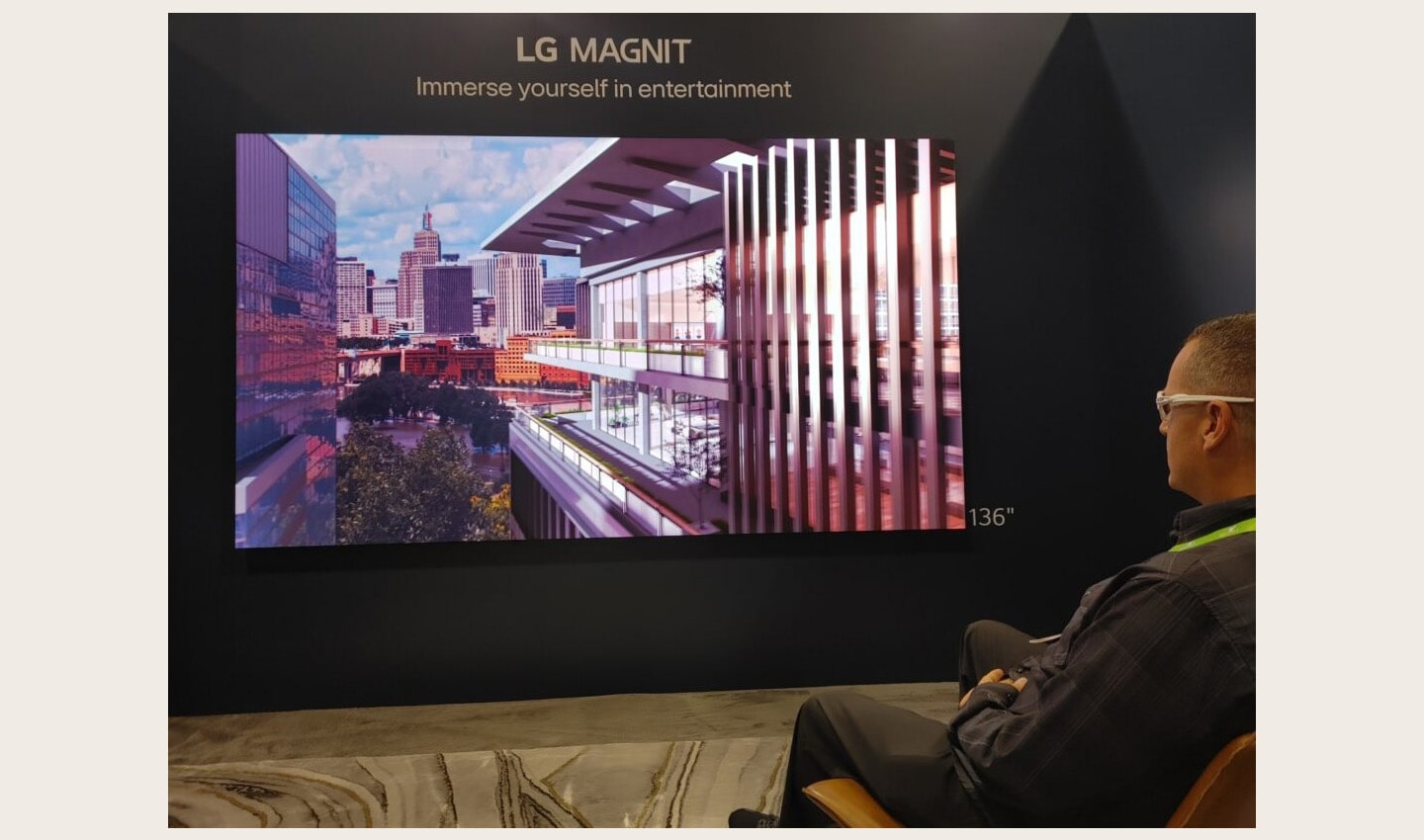 A visitor taking a look at LG MAGNIT installed at HITEC 2023