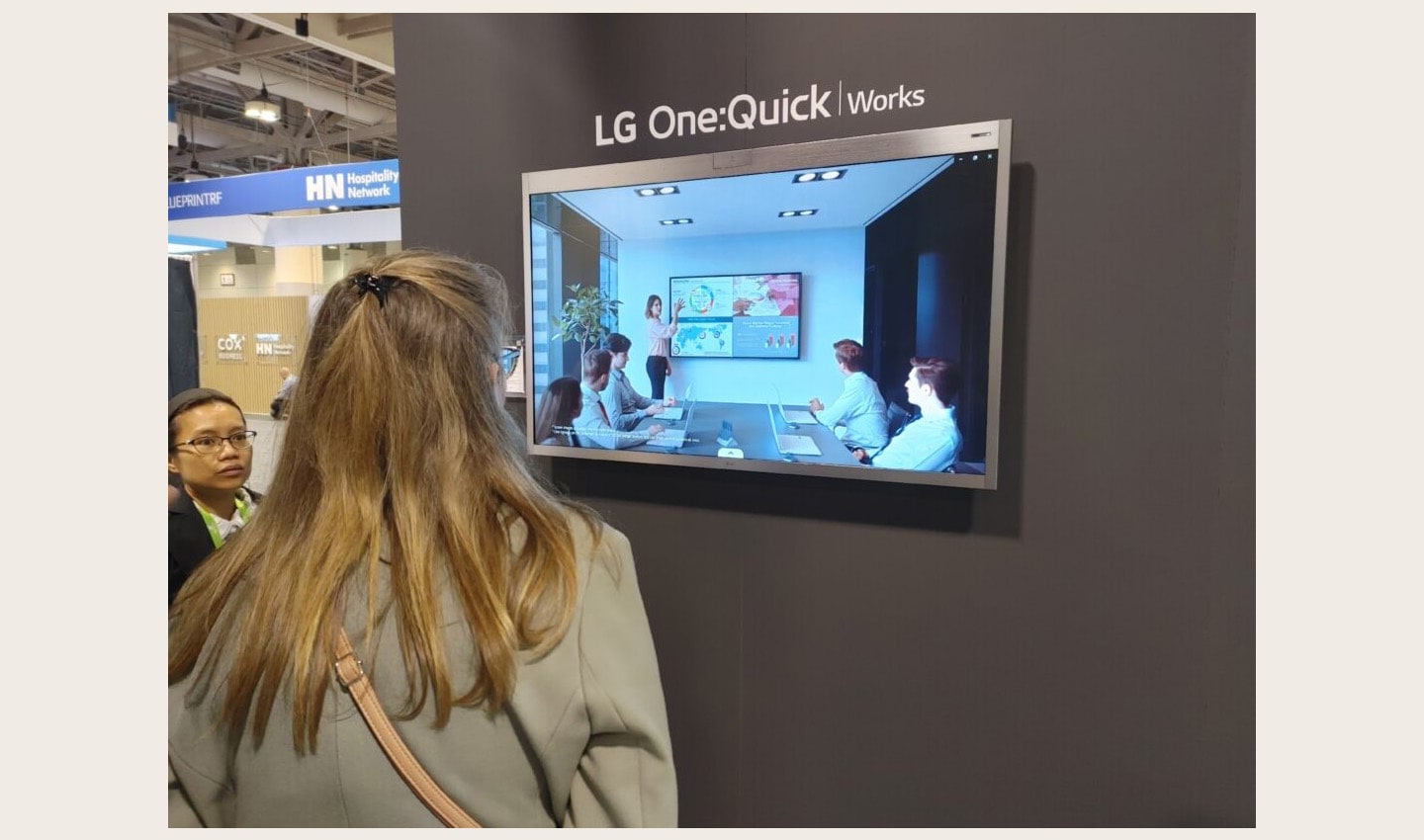 A visitor enjoying a first-hand experience of LG One:Quick Works