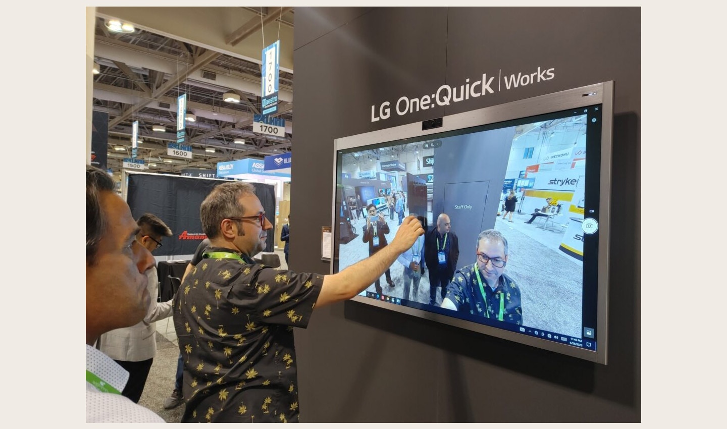 A visitor enjoying a first-hand experience of LG One:Quick Works