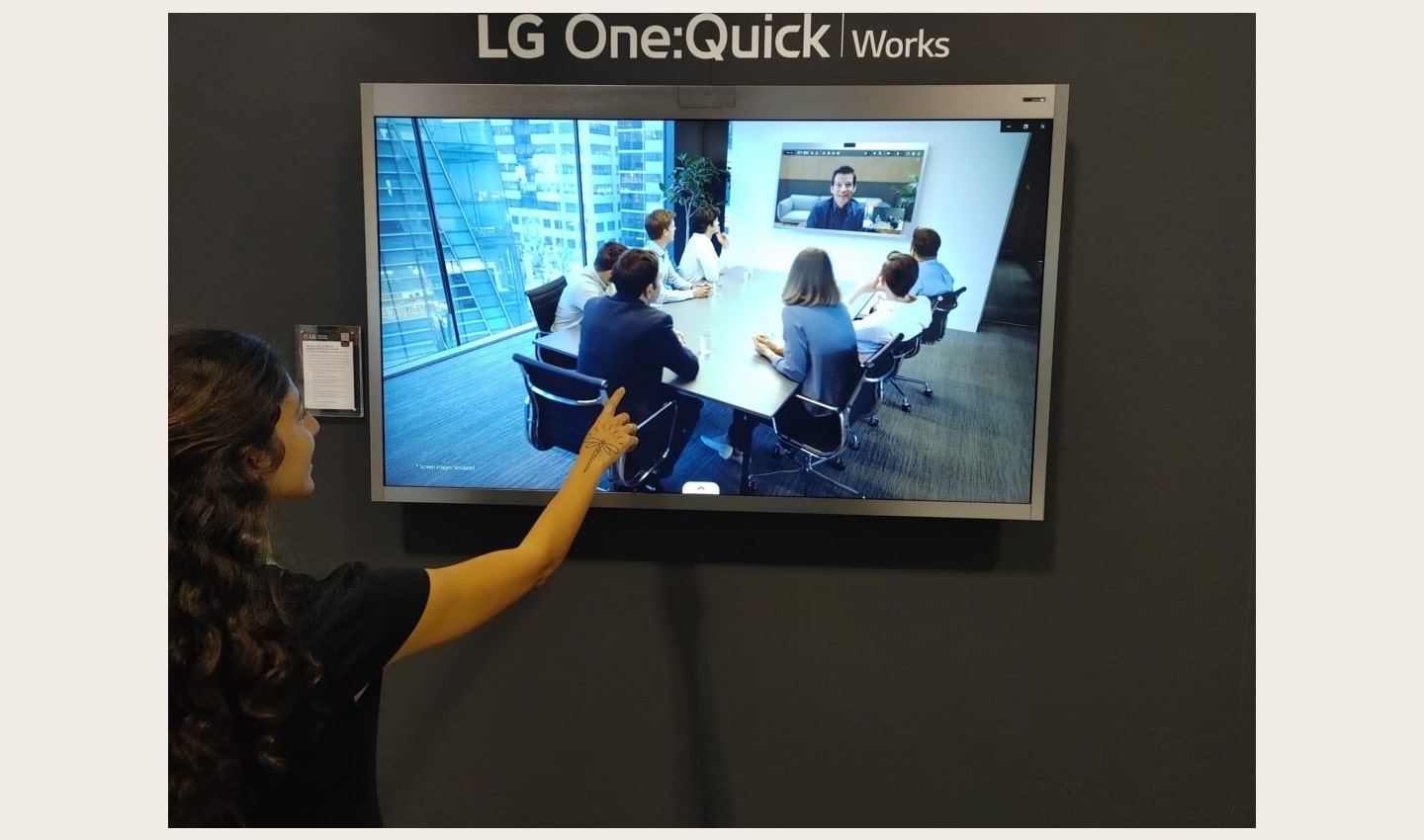 A visitor enjoying a first-hand experience of LG One:Quick Works