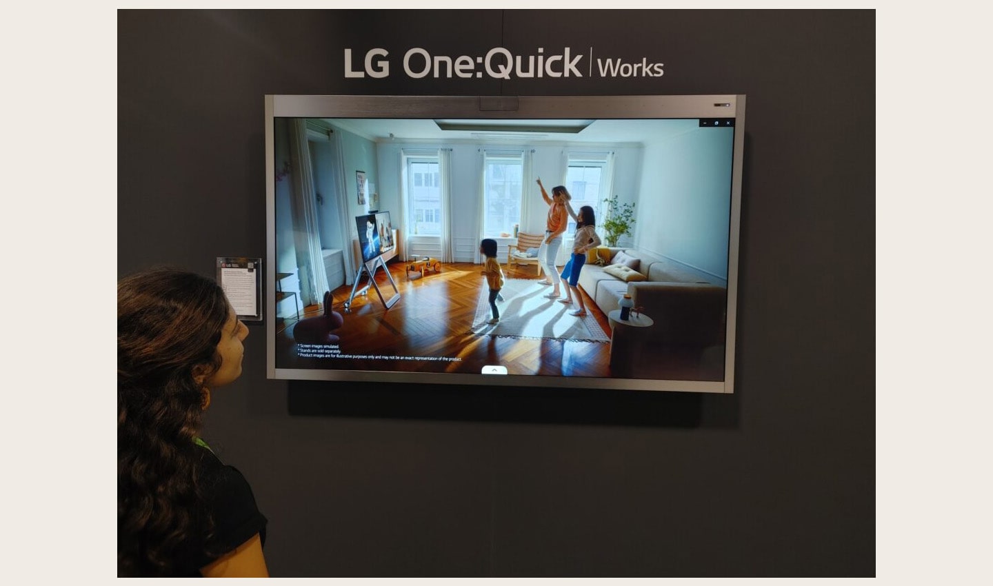 A visitor enjoying a first-hand experience of LG One:Quick Works