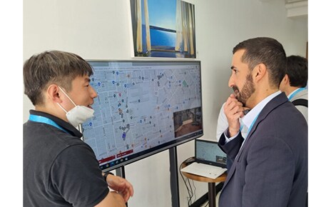   LG employee explaining about Soft V2X