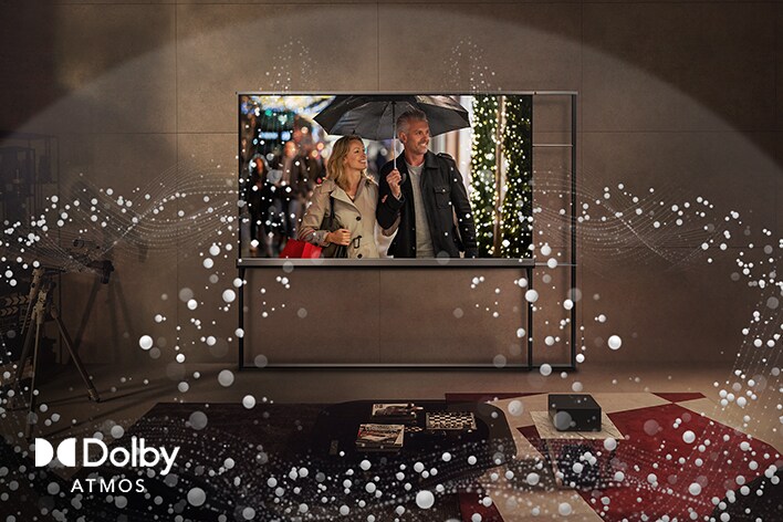 客廳牆上掛著 LG OLED TV，電視發射出抽象圓圈，填滿整個空間。