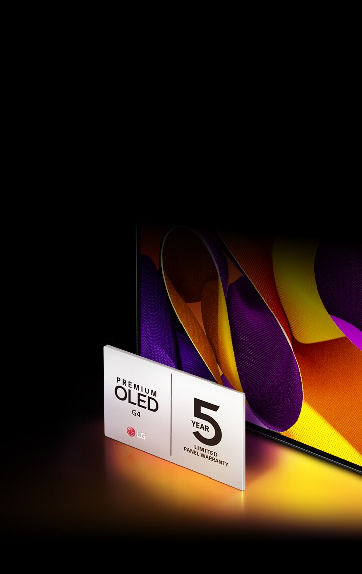 The bottom corner of LG OLED evo G4 seen from an aerial angled view with the 5-Year warranty logo. The TV shows a purple and orange abstract artwork, and colorful light casts from the TV and reflects on the floor.	