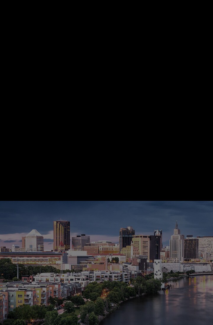 Dull low-resolution cityscape. The alpha 11 AI processor appears. Different circle icons move around the cityscape showing how the processor is analyzing every element in the frame. The processor pulses with power and the cityscape image is suddenly brighter, more detailed, and with 4K resolution thanks to AI Super Upscaling.