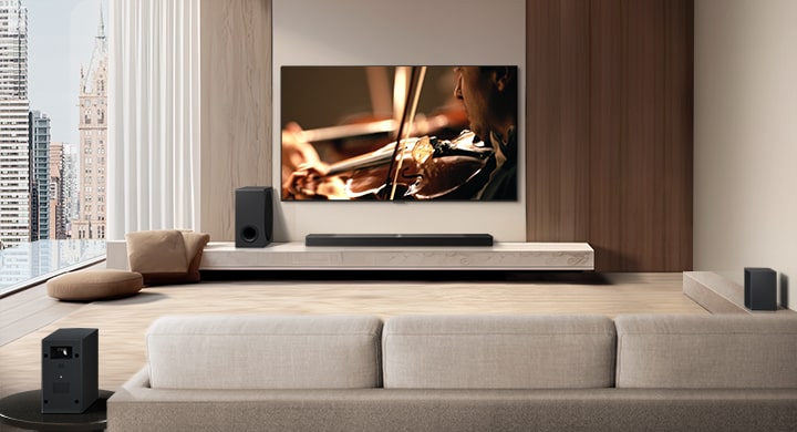 LG Soundbar, LG TV, a subwoofer and rear speakers are in a modern city apartment. The background gets dimmed, and the grid overlay appears over the image from LG TV, like a scan of the space. A dotted line extends from one of the rear speaker, to show the two rear speakers are in a linear fashion. White soundwaves made of droplets are coming out from the frontal perspective of the rear speakers.