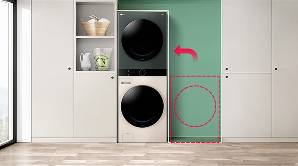 LG washer and dryer stacked in a modern laundry room with white cabinets, wooden floor, and green wall for space-saving.