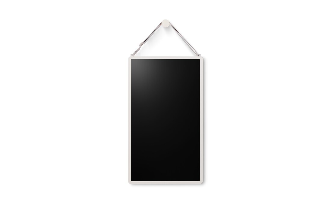 LG StanbyME 2 is hung on the wall using the wall strap.