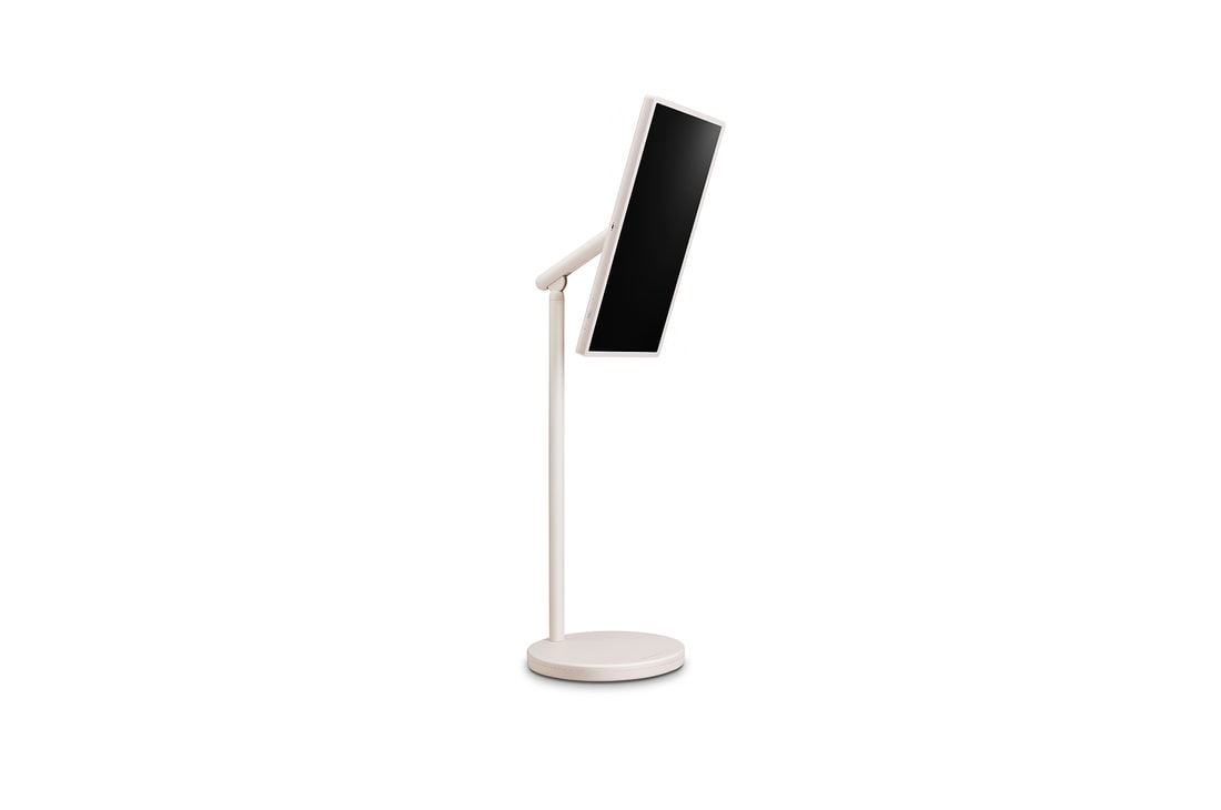 45 degree side view of the LG StanbyME 2 on stand. Screen is tilted to show its flexible orientation.
