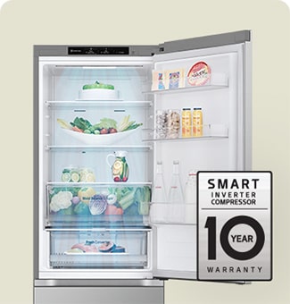 Fresh food-filled refrigerator with open door and 10-year warranty label of smart inverter compressor.