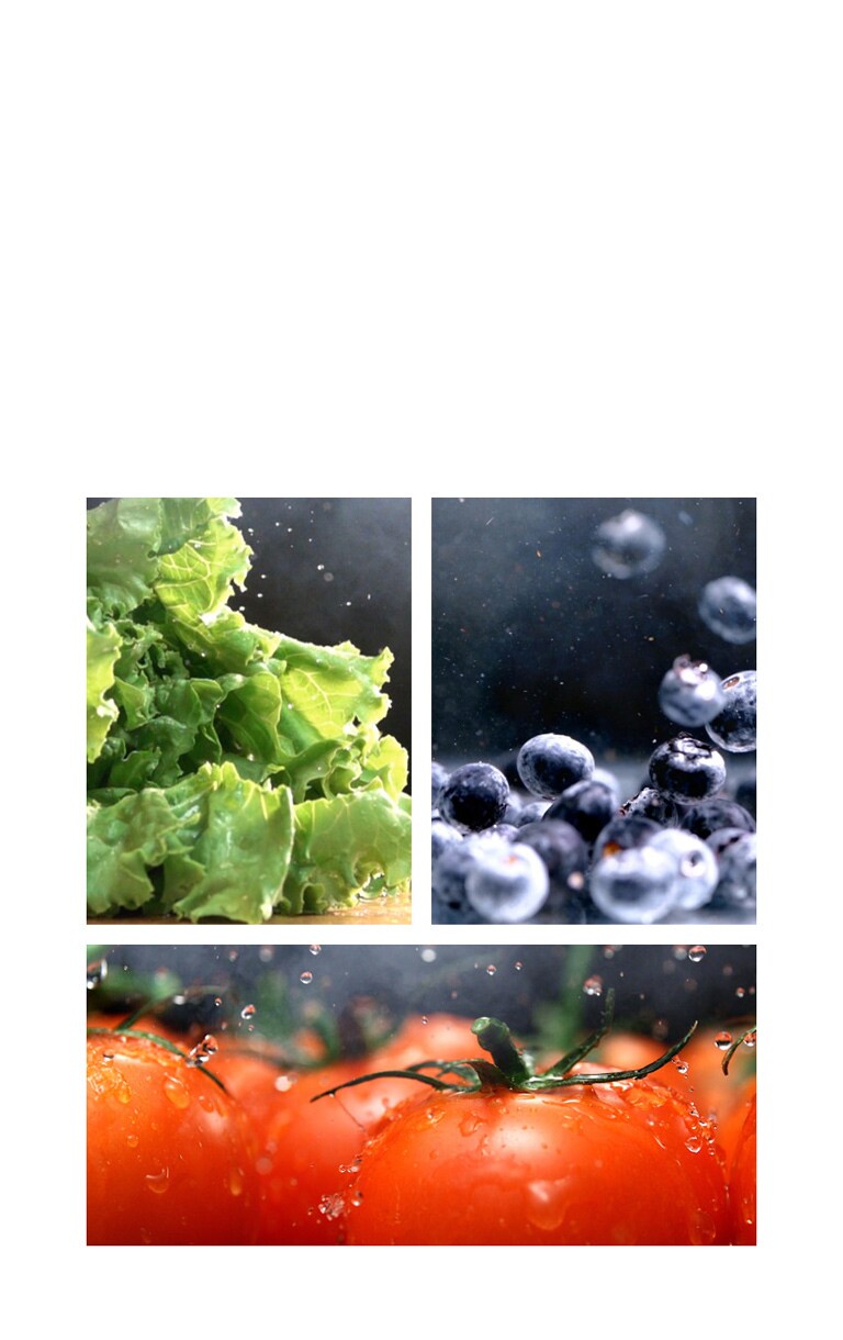 Fresh lettuce on the left, blueberries on the right, and tomatoes at the bottom being washed under water.
