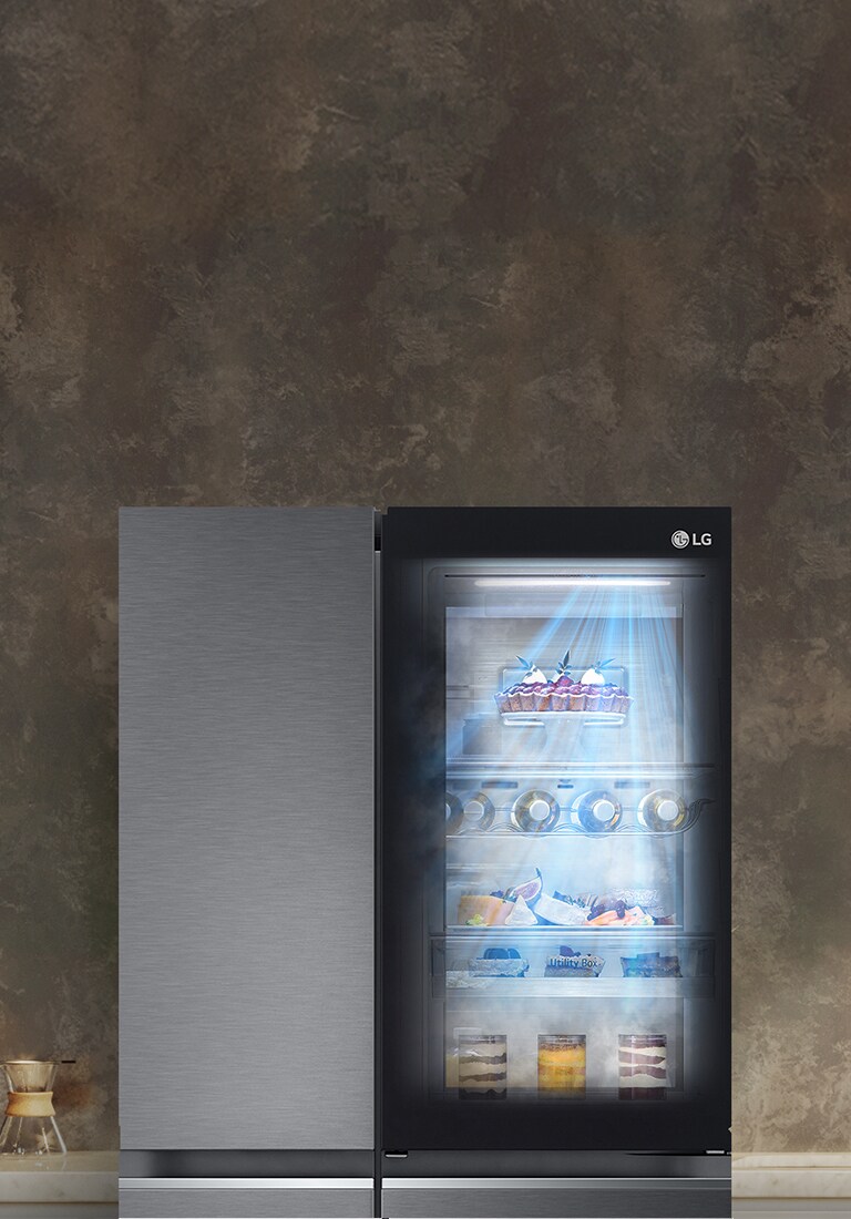LG refrigerator with transparent door on right, illuminated shelves displaying food items against a dark background.