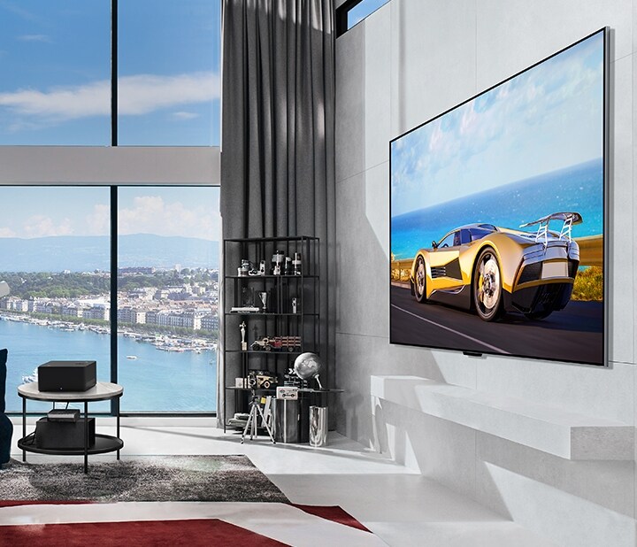 LG OLED evo M4 within an angled perspective flat against the wall of a bright, modern apartment.