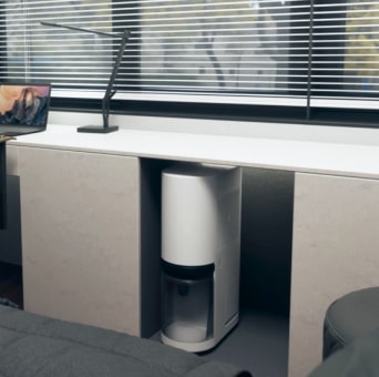 The LG dehumidifier is easily stored under the desk.	