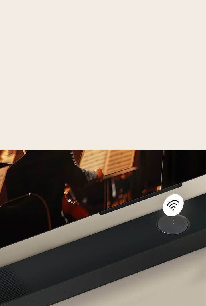 Close up of LG TV above a LG Soundbar with a WIFI symbol floating on top.