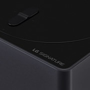 Slightly-angled close-up of the Zero Connect Box with the LG OLED logo on the edge