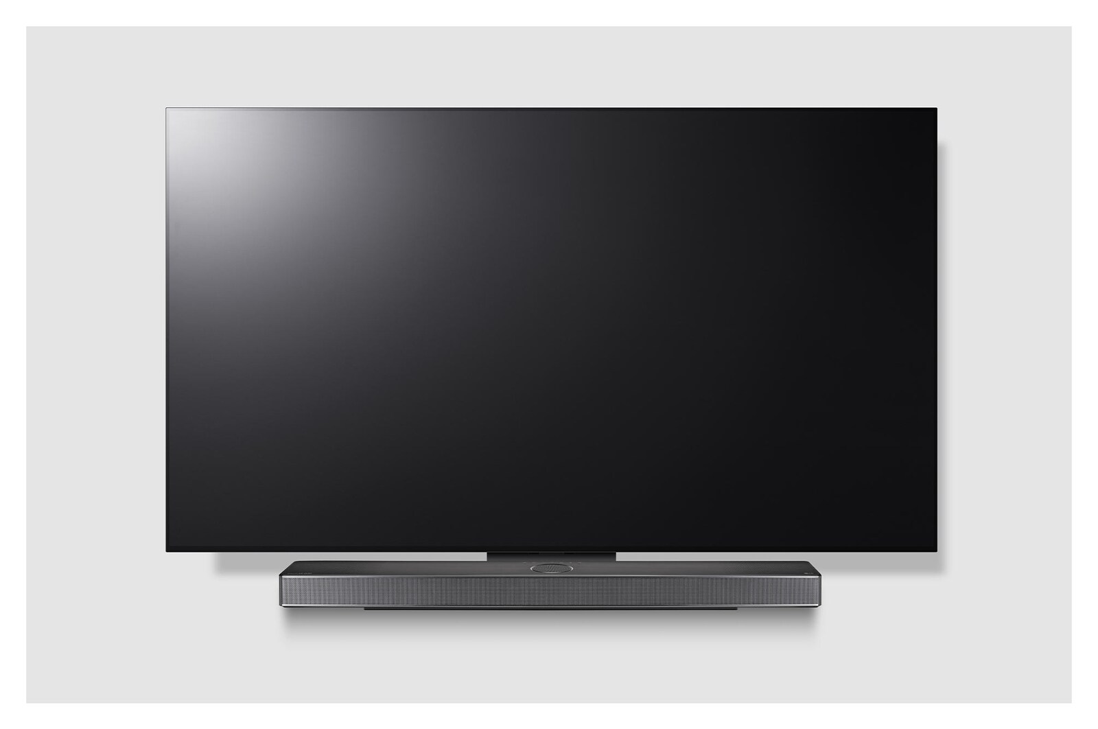 Front view of LG TV and Sound Bar mounted with an exclusive bracket
