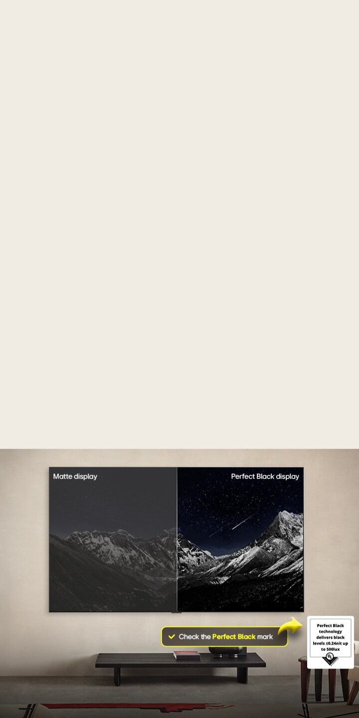 Living room space with a wall-mounted LG OLED TV. On the TV is a mountain range against a dark evening sky filled with stars. This scene is split in half. One side shows a duller, grayer version of the landscape labeled, Matte display. On the other side is a more pleasing picture with a larger dynamic range of blacks and whites. This is labeled, Perfect Black display. Logo certification is also visible, Perfect Black Technology delivers black levels less than or equal to 0.24 nit up to 500 lux. A text bubble is by its side it says, check the Perfect Black certification mark. Then a colorful parrot in ultra-high definition is seen on the TV. Water drops are suspended in the air all around it. The image showcases Perfect Color as each different hue on the parrot's body is vibrant and vivid. The dark background with the detailed water splashes also highlights how the screen is reflection-free. Different logo certifications from UL and Intertek are visible. These refer to its 100% Color Fidelity, 100% Color Volume, and reflection-free claim. Text is also visible, check the Perfect Color certification mark.