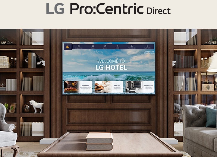 A luxury hotel room features a central TV equipped with LG Pro:Centric, displaying a welcoming message to guests.