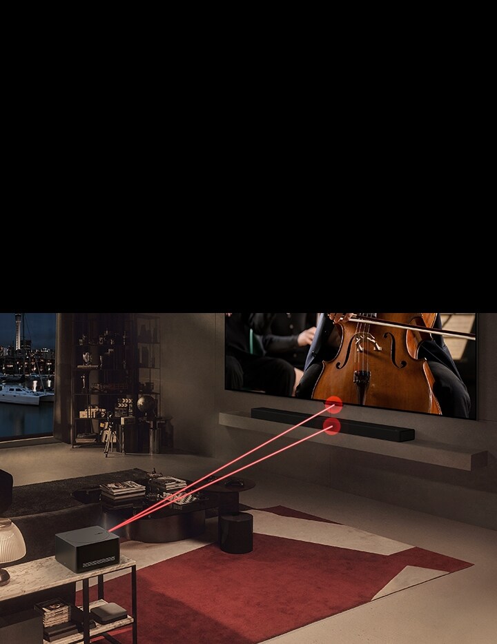 Sullo schermo dell'LG OLED evo M4 viene riprodotto un concerto e di fronte c'è il box Zero Connect. Un segnale wireless rosso appare sopra lo Zero Connect Box e due fasci di luce rossa vengono emessi verso il TV e la Soundbar LG.