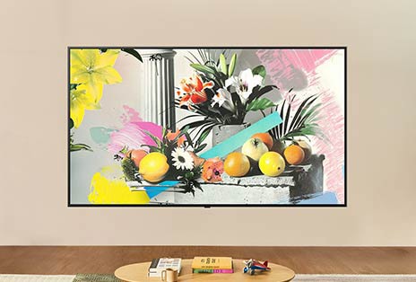 In una stanza luminosa e ben illuminata, lo schermo del TV LG mostra un’opera d’arte altrettanto luminosa che mette in evidenza come la luminosità dello schermo sia ottimizzata per la visione in qualsiasi condizione di luce.