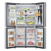 Frigorifero aperto completamente pieno di alimenti