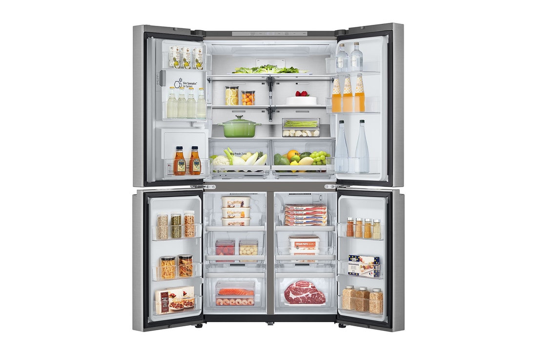 Frigorifero aperto completamente pieno di alimenti