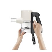 Dettaglio del corpo dell'Aspirapolvere CordZero A9T-PRIME1C mentre si aziona la leva Kompressor