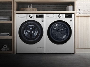 Mostra una lavatrice e un'asciugatrice affiancate