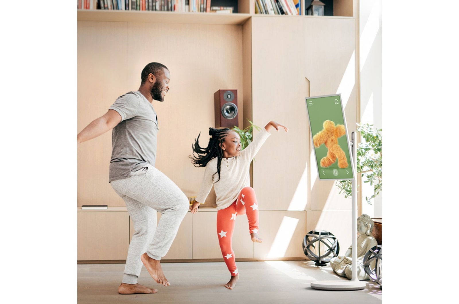 Papà e figlia che ballano vicino allo StanbyME