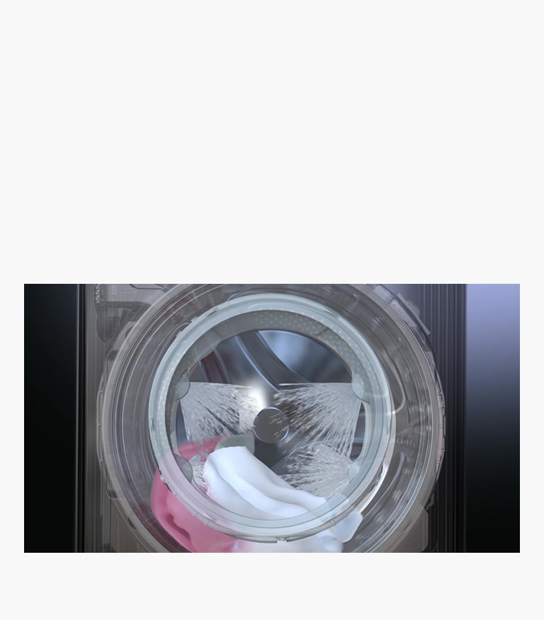 Si vede un oblò della lavatrice con 4 getti d'acqua che vengono spruzzati all'interno.