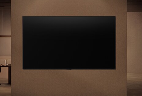 ディスプレイがオフになったWall Mounted LG TVが、TVのモーションセンサーがインテリジェントに近くの動きを検出する様子を示しています。