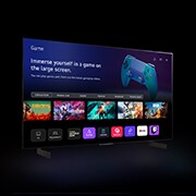 An LG C4 42 inch TV in a dark space on a two-pole stand shows the Quick Card menu on the screen.