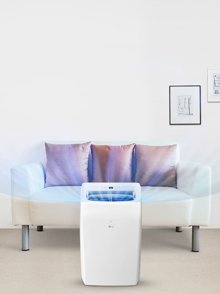 Aire acondicionado portátil LG enfriando una sala de estar con un sofá y una planta, mostrando un enfriamiento potente y avanzado.