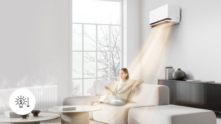 Una mujer disfruta del aire acondicionado LG con calefacción por IA, que ajusta el flujo de aire caliente.