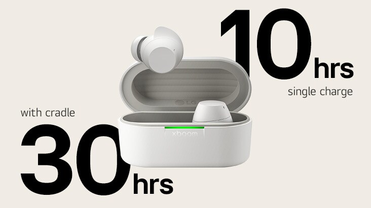 A white xboom Buds cradle is placed with its light on and with a pair of earbuds in it.
