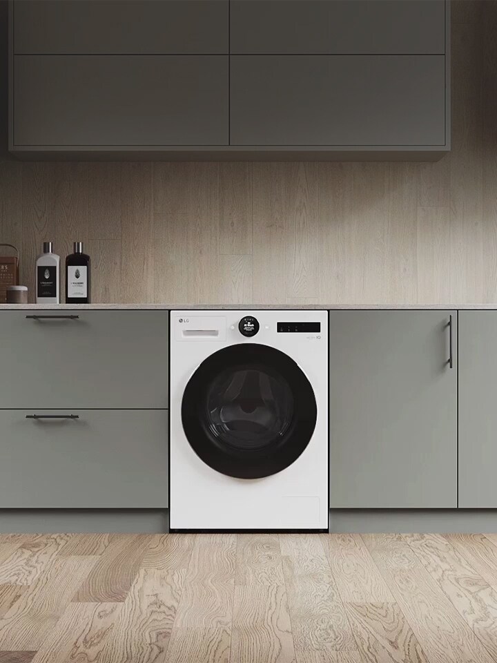 Ingezoomde wasmachine toont zijpaneel met drie kleuren: wit, lichtgrijs en donkergrijs.