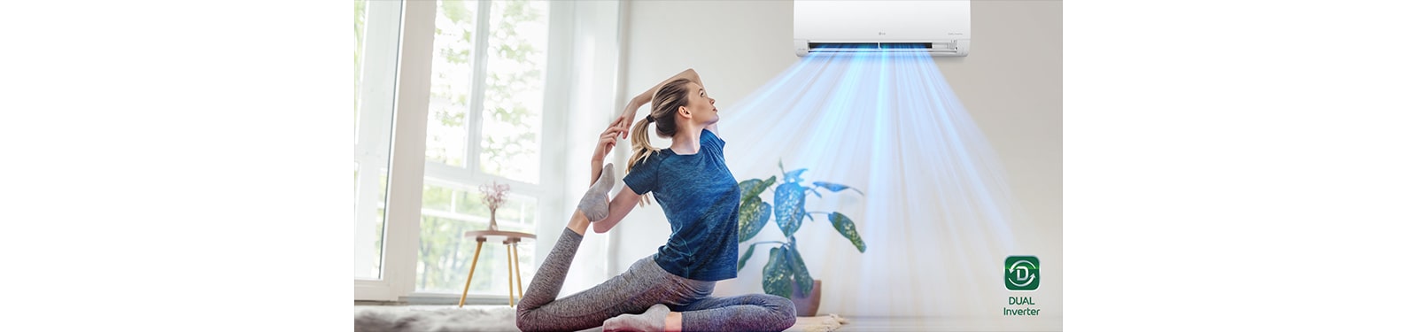 Een vrouw die yoga doet in de koele airconditioningwind.