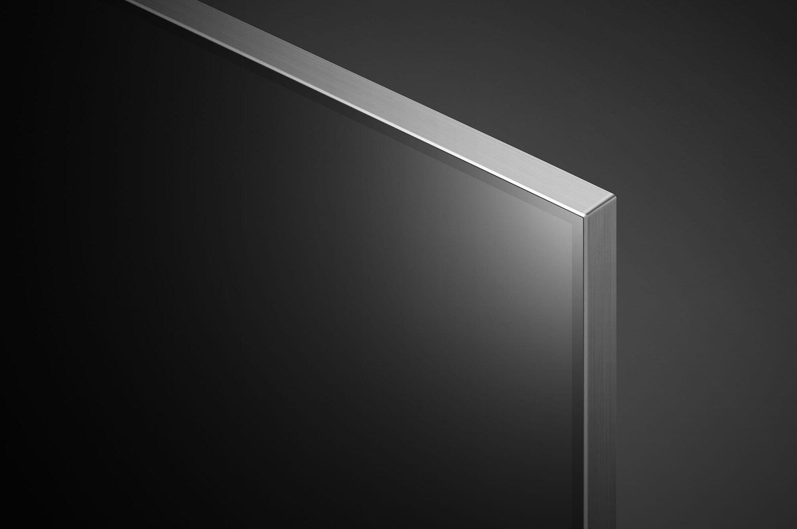 Close-up of the top edge of LG QNED TV, QNED99