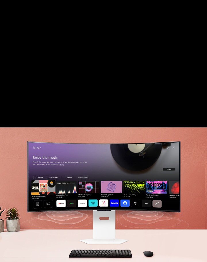 La pantalla del monitor inteligente colocado sobre la mesa muestra la pantalla de la APP MUSIC.