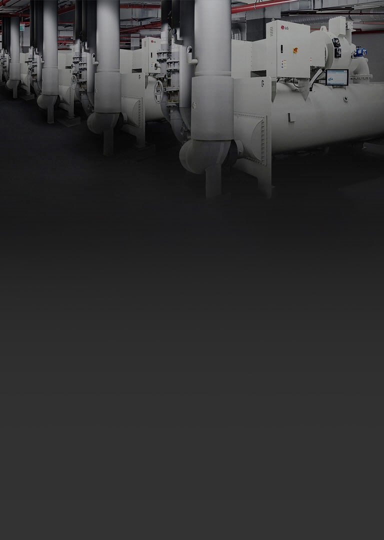 A series of large and intricate LG Chiller units, shaped circularly, are arrayed side by side, each connected by silver round pipes.