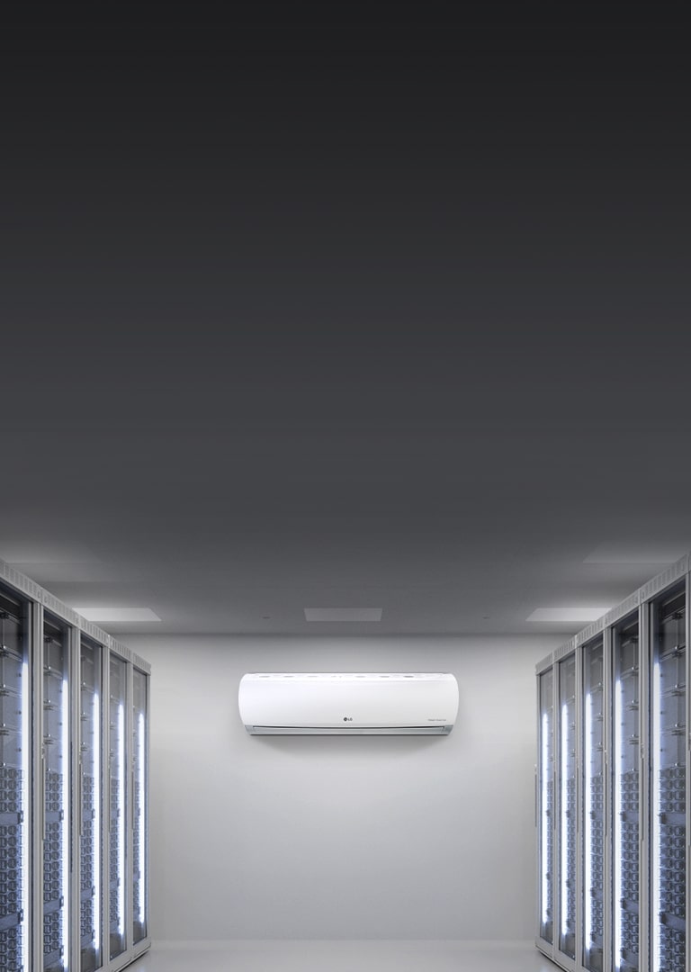 LG Wall Mounted Unit placed in the center of a room that resembles a server room, with two racks situated on each side of the room, left and right.