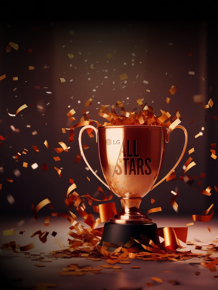 There is a golden trophy engraved with LG All Stars, and firecrackers exploded around it. Existe um troféu de ouro com LG All Stars e fogo de artifício vai explodir.